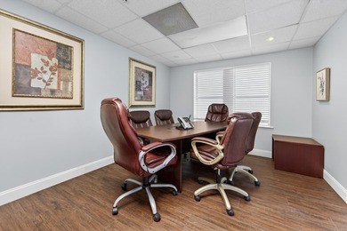 Located in the heart of downtown West Palm Beach, this office - photo 1