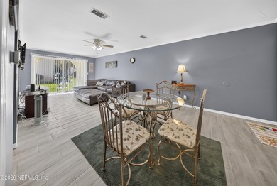 Welcome to this well-maintained ground-floor condo located in - photo 3