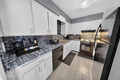 Welcome to this well-maintained ground-floor condo located in - photo 4