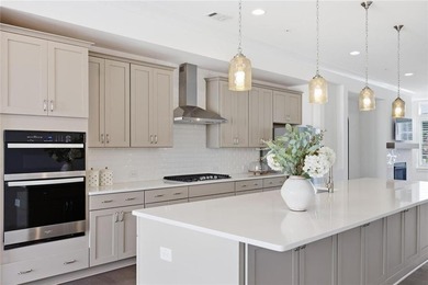 Experience luxury living in the coveted Aria WEST community