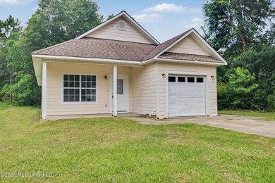 Welcome home to 11609 Oaklane Drive in north Gulfport! This - photo 1