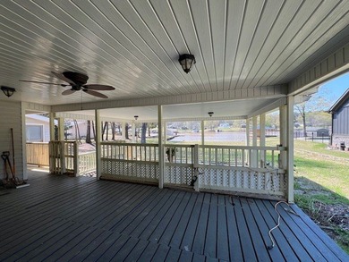Big open water front home on Lake Sinclair! Located on the - photo 2
