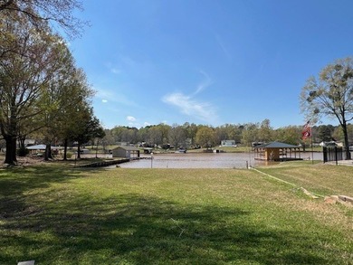 Big open water front home on Lake Sinclair! Located on the - photo 3