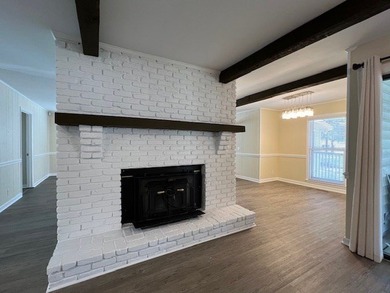 Big open water front home on Lake Sinclair! Located on the - photo 9