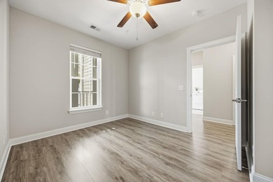 This well-maintained condo in Queens Harbor offers comfort