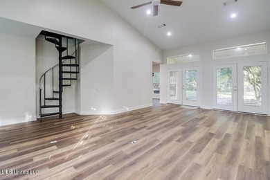 YOU WILL BE IN LOVE WITH THIS 4-BEDROOM DIAMONDHEAD HOME!!! - photo 4