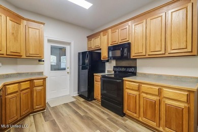 YOU WILL BE IN LOVE WITH THIS 4-BEDROOM DIAMONDHEAD HOME!!! - photo 6
