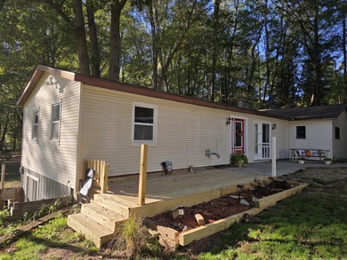 Enjoy lake living full or part time at all sports Littlefield - photo 2