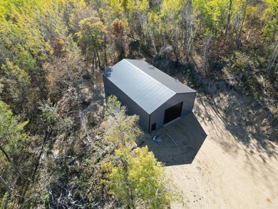 Motivated seller. Discover your ideal getaway with this inviting - photo 9