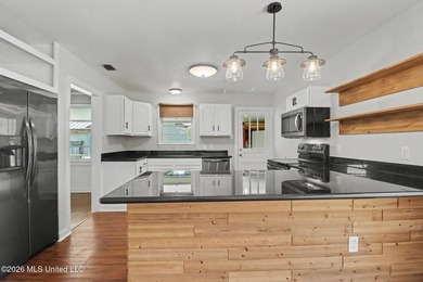 Nestled in the heart of Bayou View, this adorable 2-bedroom - photo 9