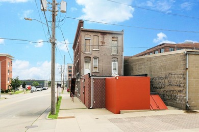 You could be the proud new owner of this three story brick - photo 3