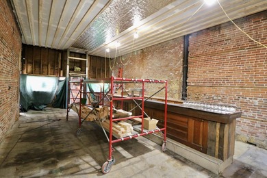 You could be the proud new owner of this three story brick - photo 5