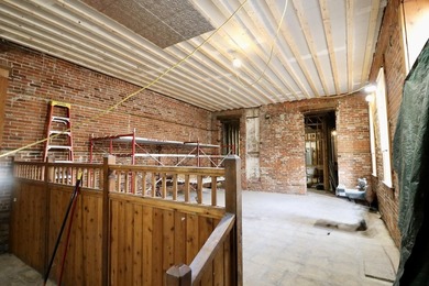 You could be the proud new owner of this three story brick - photo 6