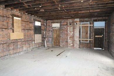 You could be the proud new owner of this three story brick - photo 9