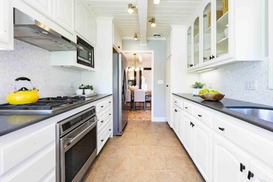 Set on a cul-de-sac in Midtown, this inviting home blends - photo 7