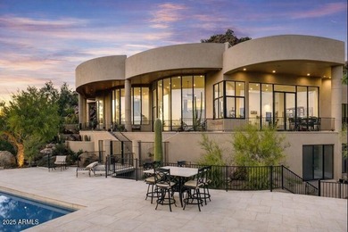 Nestled against a dramatic mountain backdrop and framed by