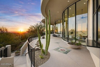 Nestled against a dramatic mountain backdrop and framed by