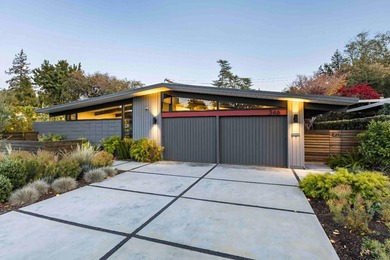 Completely renovated, this exceptional home blends iconic design - photo 2