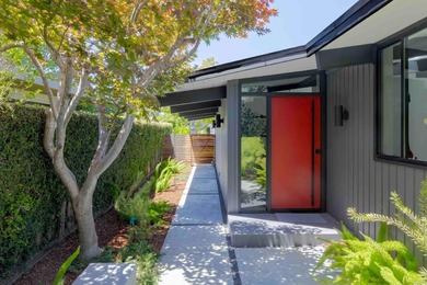 Completely renovated, this exceptional home blends iconic design - photo 3