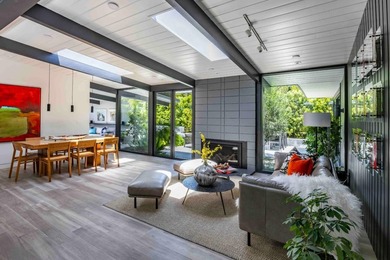 Completely renovated, this exceptional home blends iconic design - photo 4