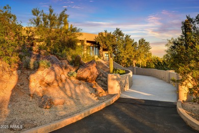Nestled against a dramatic mountain backdrop and framed by