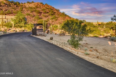Nestled against a dramatic mountain backdrop and framed by