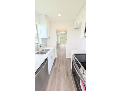 Don't miss this beautifully updated 2BR/1BA second-floor corner - photo 13