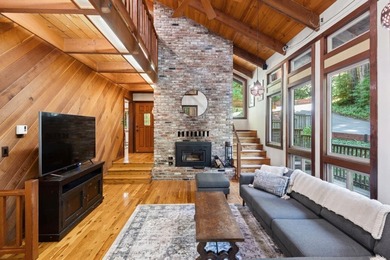 A private road and paved, circular driveway lead to this custom - photo 4