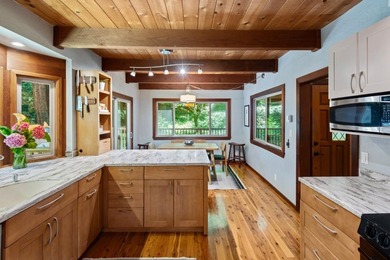 A private road and paved, circular driveway lead to this custom - photo 7
