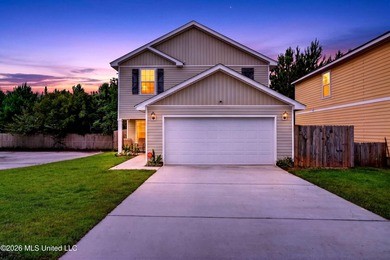 Welcome to this spacious 3-bedroom, 2.5-bath home featuring a - photo 1