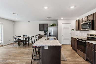 Welcome to this spacious 3-bedroom, 2.5-bath home featuring a - photo 5