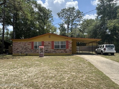 Cute 3 Bedrooms 2 Baths Brick and Concrete Block Home, screened - photo 1