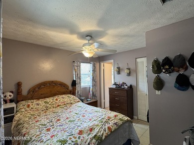 Cute 3 Bedrooms 2 Baths Brick and Concrete Block Home, screened - photo 7