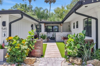 Thoughtfully renovated inside and out, this Neptune Beach home - photo 3