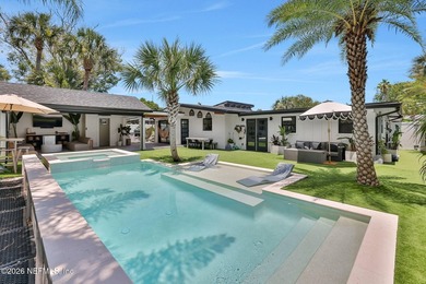 Thoughtfully renovated inside and out, this Neptune Beach home - photo 5