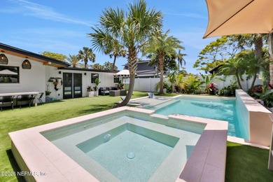 Thoughtfully renovated inside and out, this Neptune Beach home - photo 6