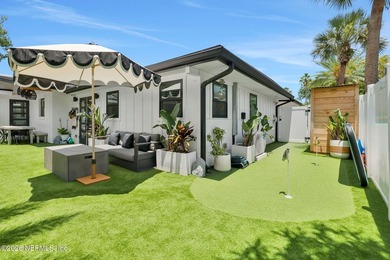 Thoughtfully renovated inside and out, this Neptune Beach home - photo 8