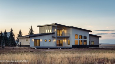 Lake Home For Sale in Driggs, Idaho