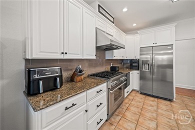 Welcome to this stunning full brick 4-bedroom, 3.5-bath home in - photo 18
