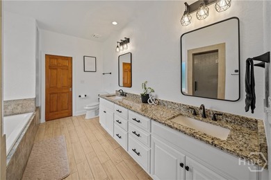 Welcome to this stunning full brick 4-bedroom, 3.5-bath home in - photo 32