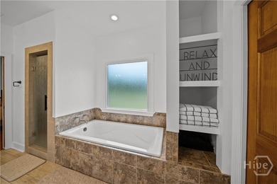 Welcome to this stunning full brick 4-bedroom, 3.5-bath home in - photo 33