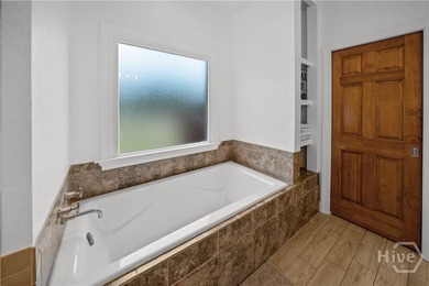 Welcome to this stunning full brick 4-bedroom, 3.5-bath home in - photo 35