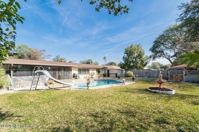 This spacious 3 bedroom, 2 bath POOL home offers 1,714 square - photo 2