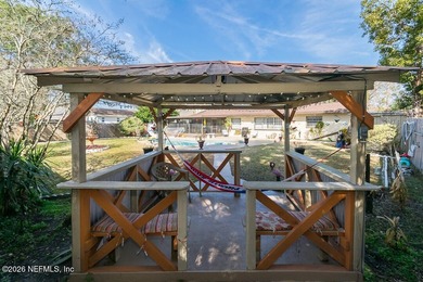 This spacious 3 bedroom, 2 bath POOL home offers 1,714 square - photo 3