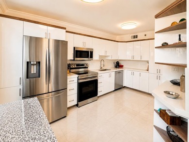 Welcome to Promenade at Boca Pointe. Beautifully renovated and - photo 2