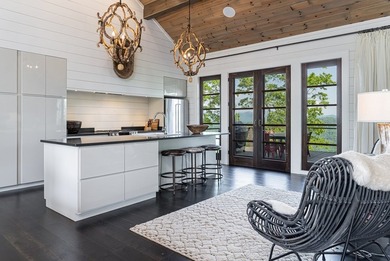 Perched above the pristine waters of Lake Fontana, this - photo 11