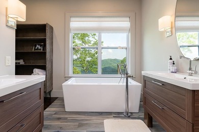 Perched above the pristine waters of Lake Fontana, this - photo 20