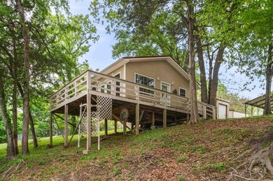 Tucked away in the natural beauty of Royal, Arkansas, this warm - photo 23