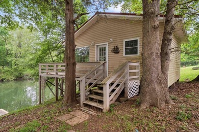 Tucked away in the natural beauty of Royal, Arkansas, this warm - photo 24