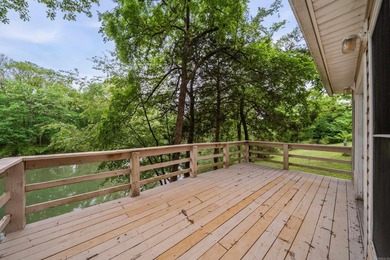 Tucked away in the natural beauty of Royal, Arkansas, this warm - photo 25